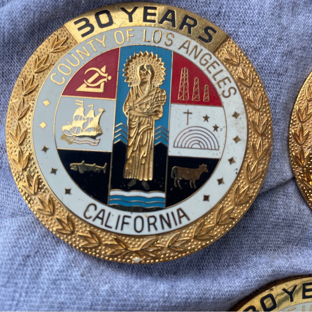 Source Unknown Gold and Multicolor Commemorative Coin 30 years on service